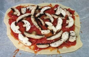 Pizza tomates cerises mozzarella champignons