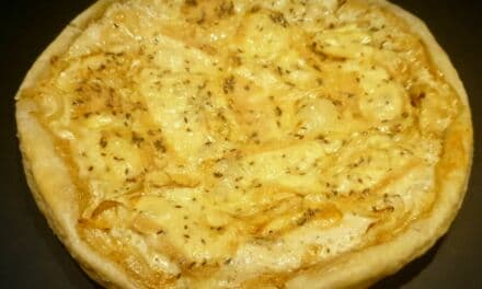 Recette de Tarte au munster au cumin aux oignons caramélisés